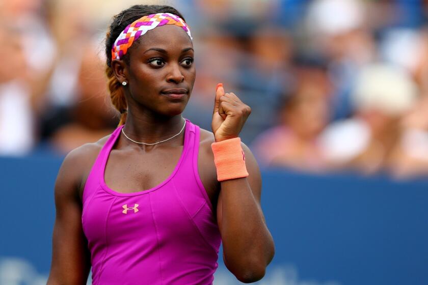 Sloane Stephens celebrates a point during her first-round victory over Mandy Minella at the U.S. Open on Monday.