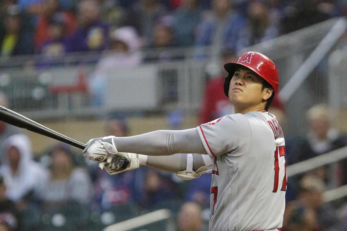 The Angels' Shohei Ohtani flies out to left field during the first inning Sept. 24, 2022, in Minneapolis. 