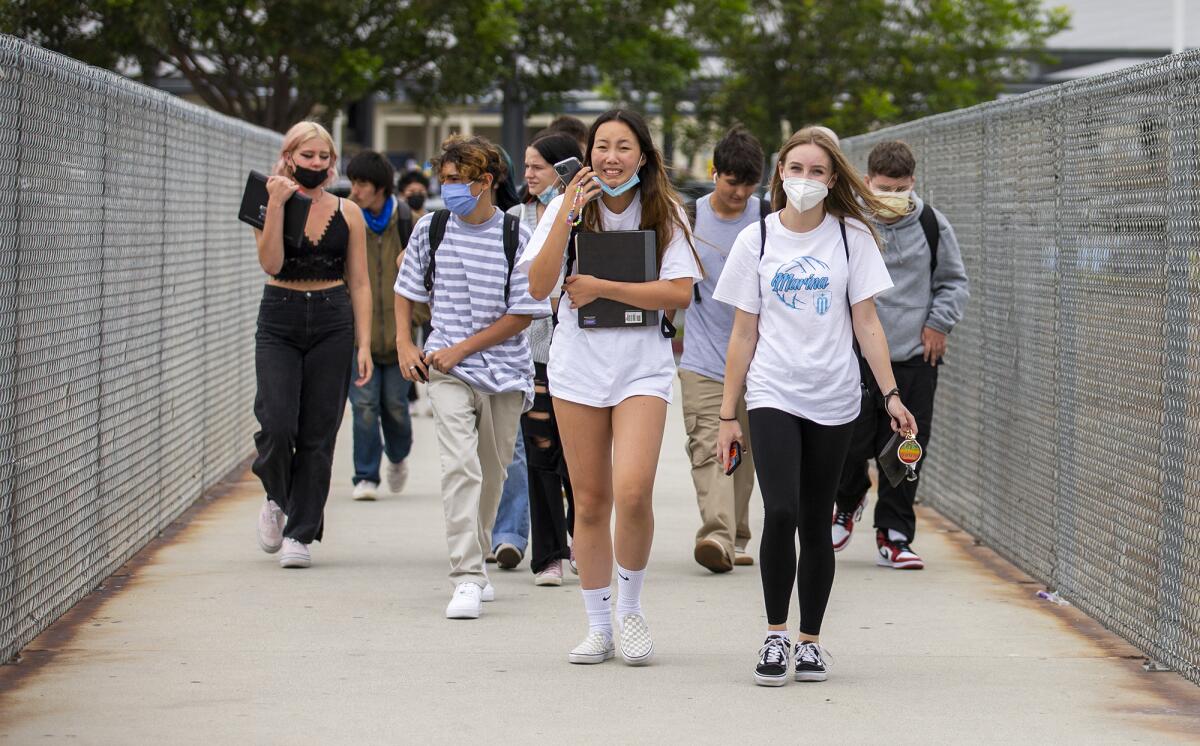 Marina High School students leave the campus on Wednesday at the end of the first day of school for the 2021-22 year.