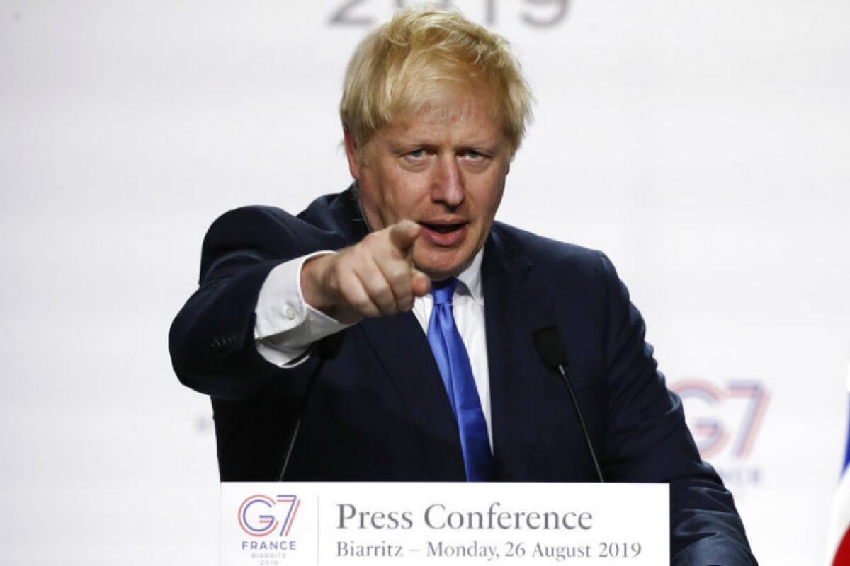 British Prime Minister Boris Johnson holds a news conference Aug. 26 at the G-7 summit in Biarritz, France.