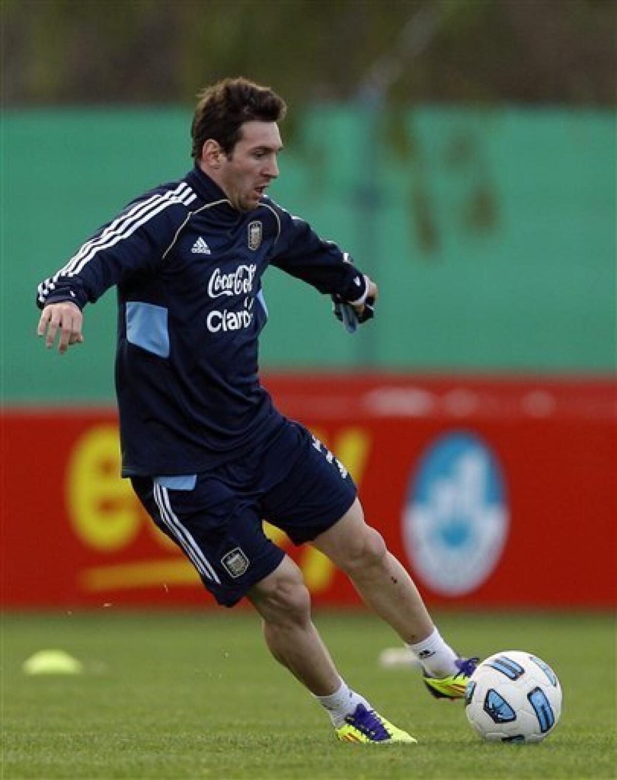 Argentina's Lionel Messi controls the ball during a training session ahead the Copa America in Buenos Aires, Argentina, Thursday, June 23, 2011. Argentina will host the Copa America soccer tournament from July 1 to July 24. (AP Photo/Eduardo Di Baia)