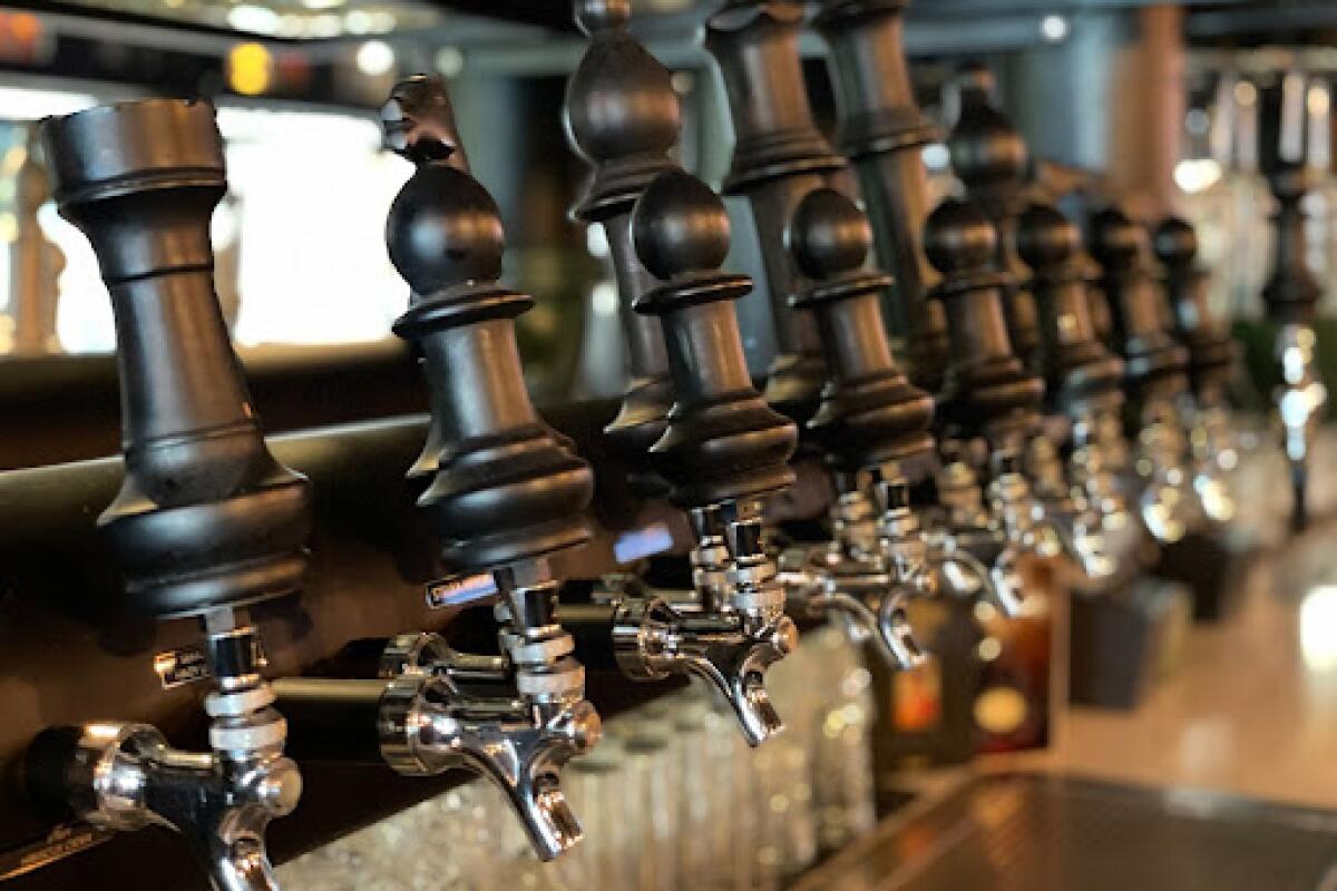 Chess piece-shaped handles on the taps at the Chess Park Lounge.