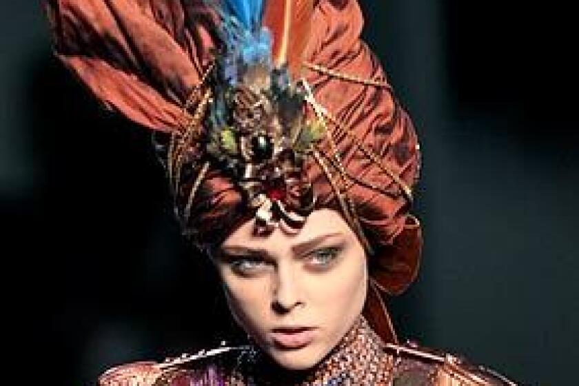 The fall couture collections in Paris were steeped in decadence, with models draped in elegant fabrics with elaborate additions of feathers and jewels. Jean Paul Gaultiers turban look with feathers and beads conjured silky visions of princes and maharajas.