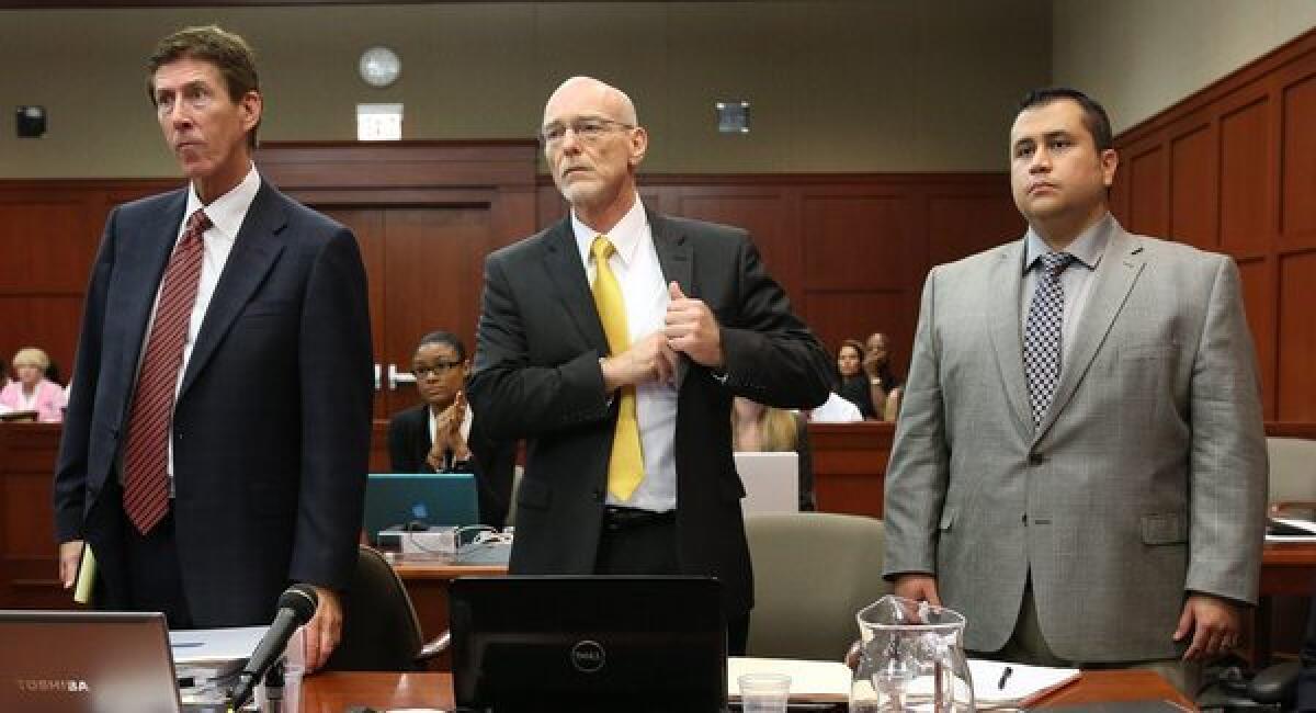 George Zimmerman, right, with attorneys Mark O'Mara, left, and Don West as the jury enters the courtroom in Sanford, Fla.