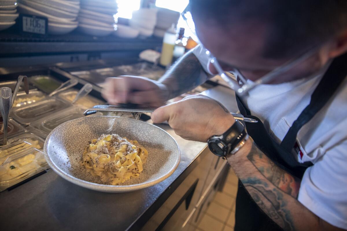 Élephante chef Phil Rubino prepares tagliatelle