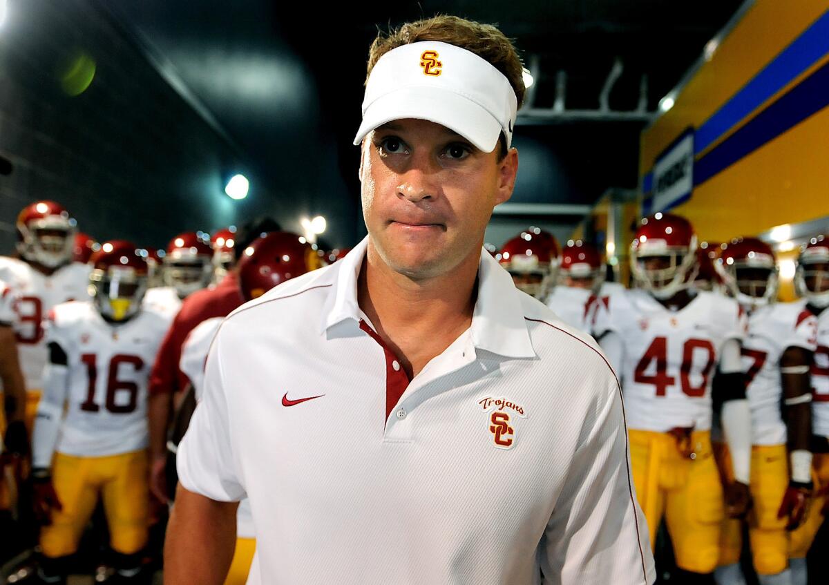 Coach Lane Kiffin's Trojans have been ranked No. 24 in both the coaches' and media preseason polls.