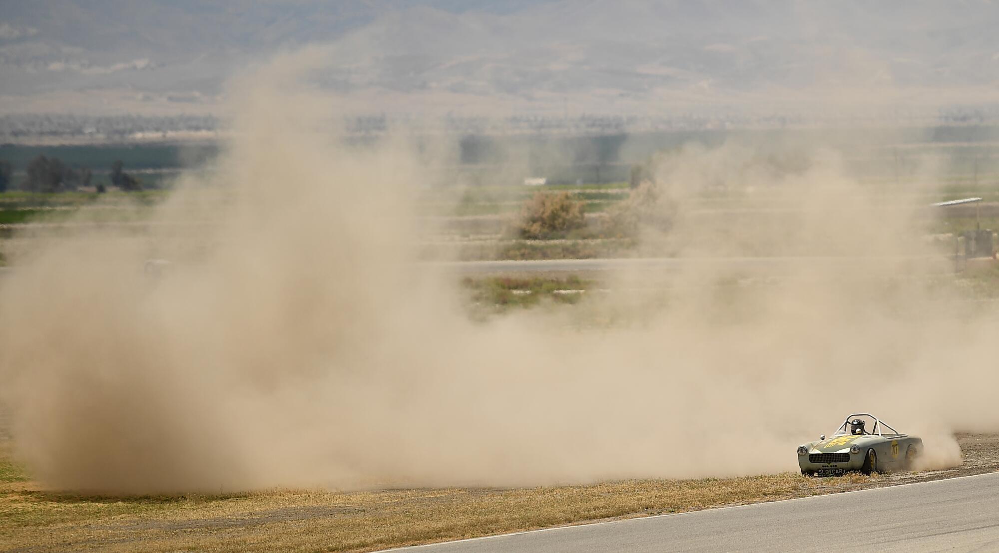 A race car loses control during a race at Buttonwillow Raceway in Buttonwillow, Calif., on Saturday.