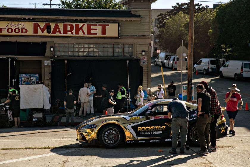 LOS ANGELES, CA - SEPTEMBER 22: A Rockstar Energy commercial films at Bob's Market in Angelino Heights on Thursday, Sept. 22, 2022 in Los Angeles, CA. (Jason Armond / Los Angeles Times)