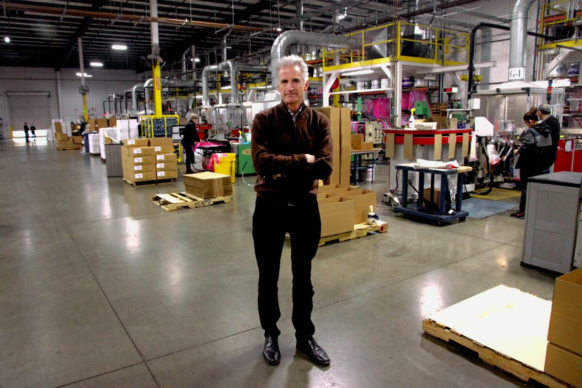 Kevin Kelly, chief executive of Emerald Packaging, on the Bay Area factory floor where he instituted coronavirus safety protocols.