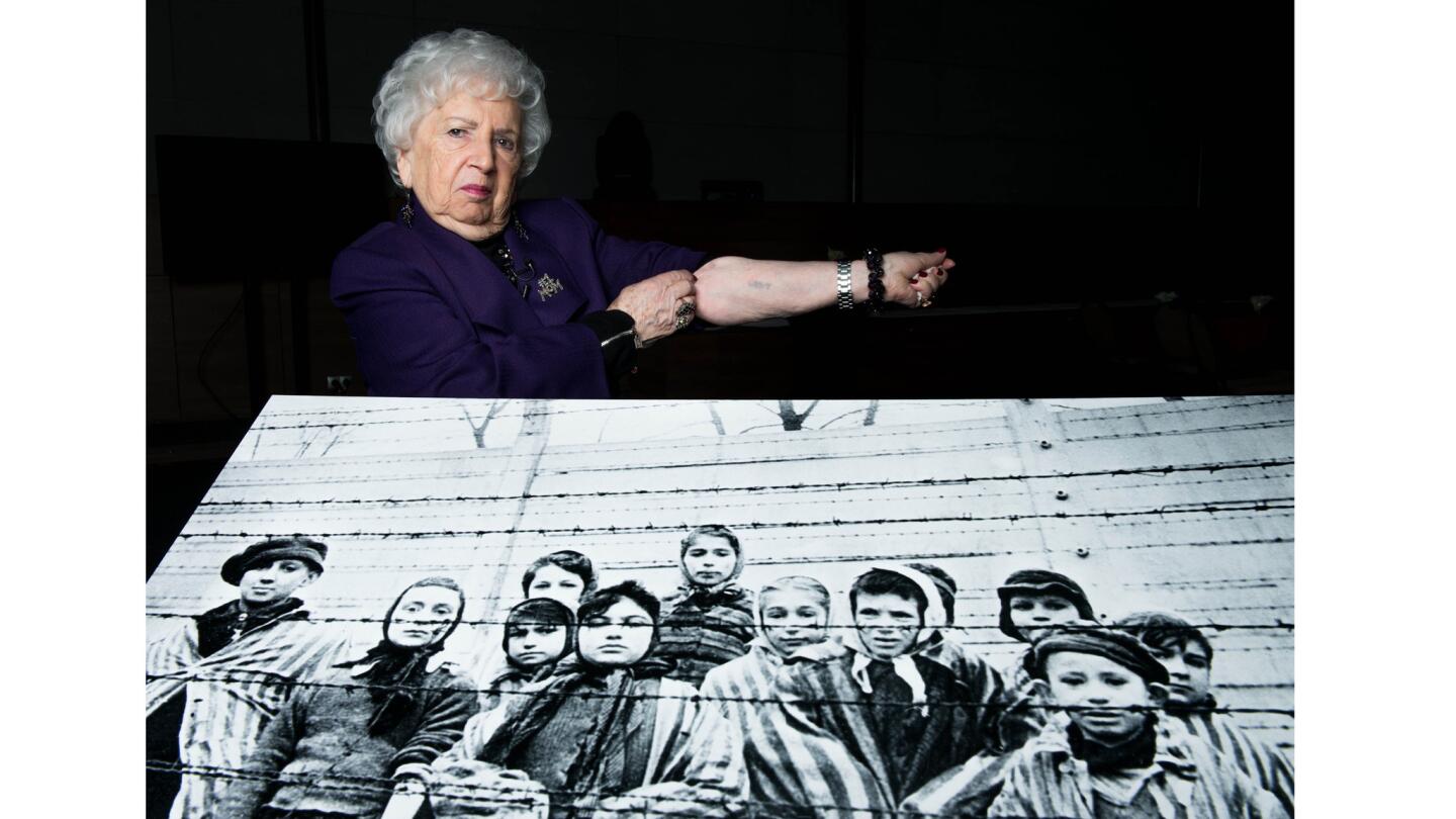 Miriam Ziegler, with iconic Auschwitz image