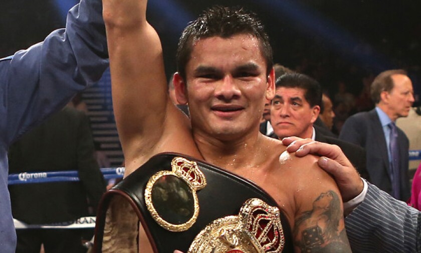 Marcos Maidana celebrates after knocking out Jesus Soto Karass during a WBA intercontinental welterweight title fight in September 2012. Maidana is scheduled to fight Floyd Mayweather Jr. on May 3.