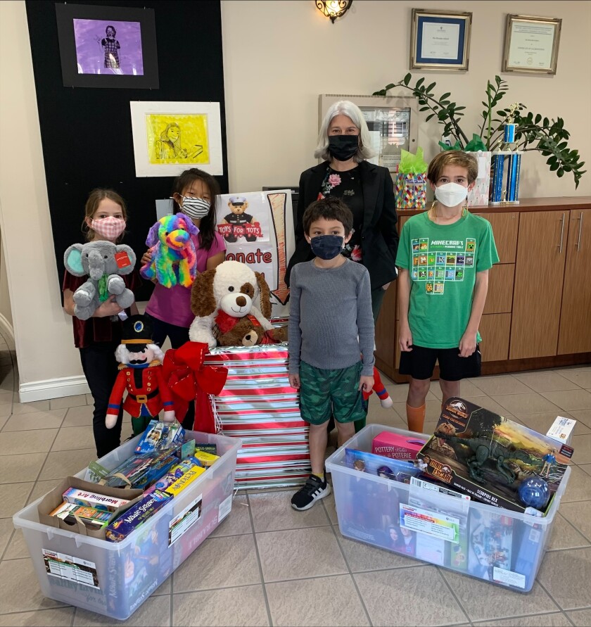 Students at The Rhoades School spread holiday cheer to their community by collecting toys for Toys for Tots.