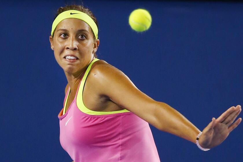 Madison Keys plays a forehand during her third-round upset over Petra Kvitova at the Australian Open on Saturday.