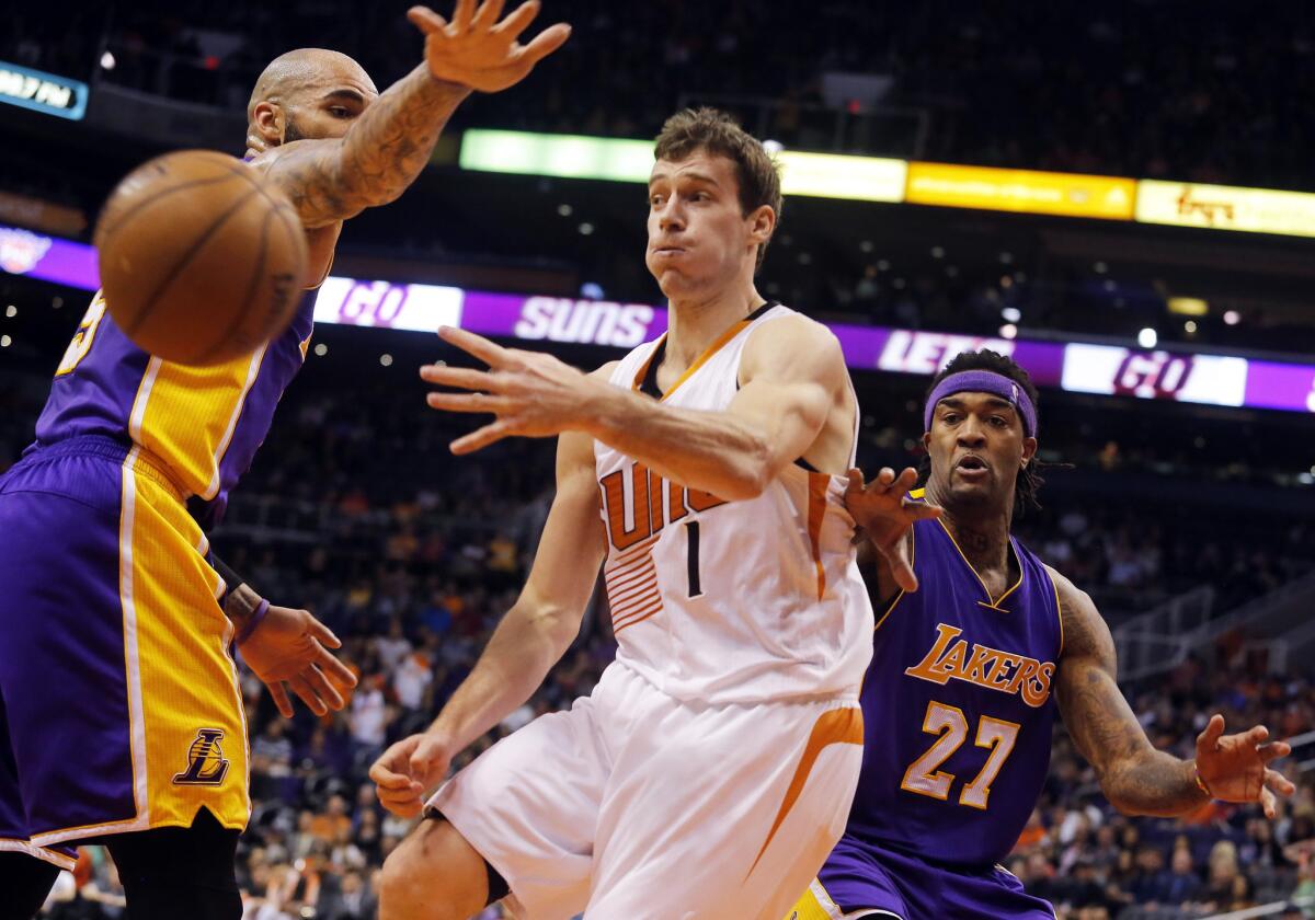 Could Suns guard Goran Dragic soon be teammates with Lakers power forward Carlos Boozer and center Jordan Hill, who he passes around here?