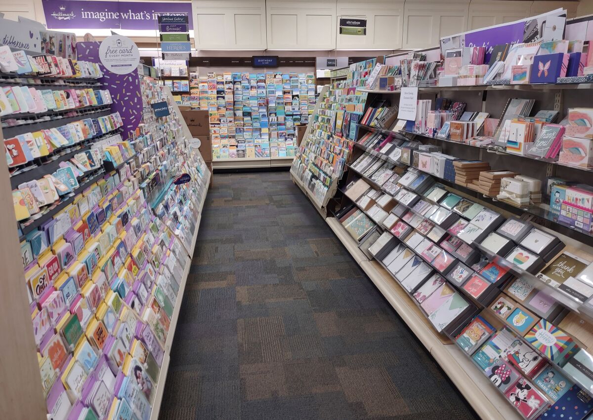The Elam family has been selling cards and gifts at the Hallmark store in Ramona since 1994.