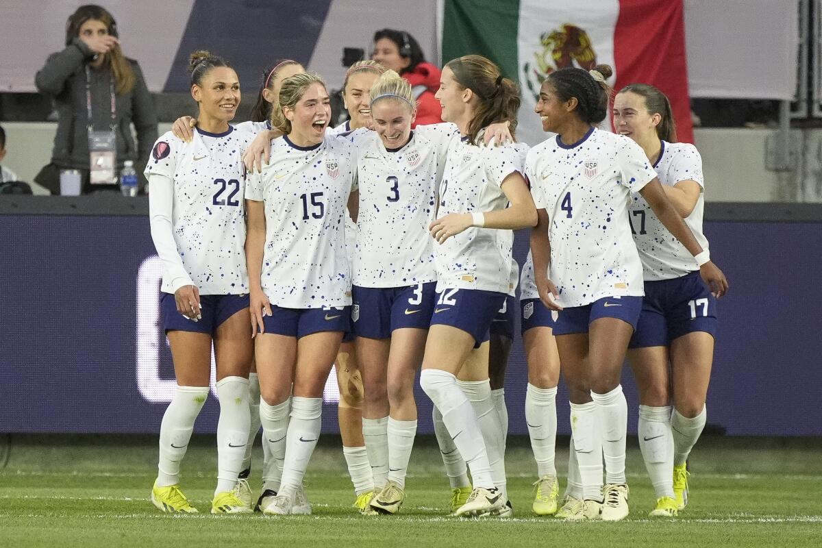 U.S. defender Jenna Nighswonger (3) celebrates with teammates after her goal during Sunday's Gold Cup win over Colombia.