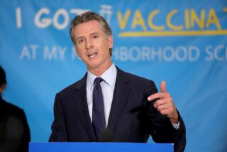 LOS ANGELES, CA - MAY 27: Governor Gavin Newsom unveils a $116.5 million COVID-19 vaccine incentive plan, including cash prizes and gift cards at Esteban Torres High School, a COVID-19 vaccination site, on Thursday, May 27, 2021 in Los Angeles, CA. New efforts by the state to encourage more Californians - especially those in communities that have been hit hardest by the pandemic - to get vaccinated. (Gary Coronado / Los Angeles Times)