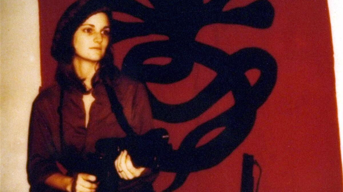 After being kidnapped by the SLA and appearing to join them, Patty Hearst became the epitome of radical chic. (Associated Press)