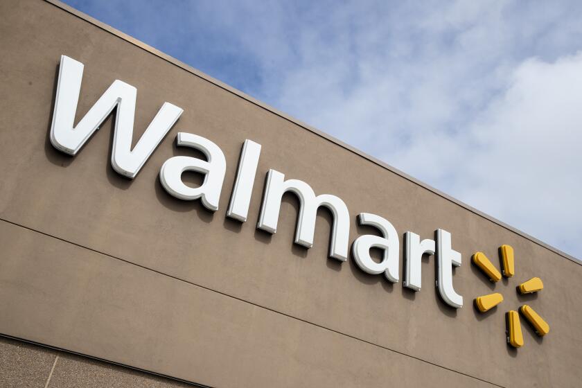 File- A Walmart in Warrington, Pa., is shown Tuesday, March 17, 2020. A couple in Minnesota wore red face masks emblazoned with swastikas to a Walmart in a video posted on social media. Police were called Saturday, July 25, 2020, to the Walmart in Marshall, Minn., in the southwest part of the state, on a report that two shoppers were wearing the mask with the symbol used by the Nazi Party. (AP Photo/Matt Rourke, File)