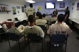 Inmates at the East Mesa Reentry Facility Job Center take a orientation class with instructors from Second Chance. The program helps inmates prepare for job interviews before their release from jail.