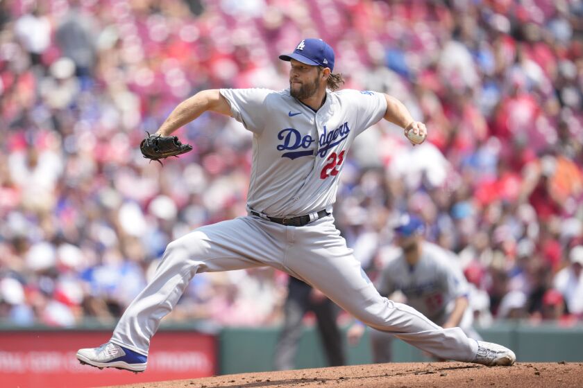 Los Angeles Dodgers starting pitcher Clayton Kershaw (22) throws in the first inning of a baseball game against the Cincinnati Reds in Cincinnati, Thursday, June 8, 2023. (AP Photo/Jeff Dean)