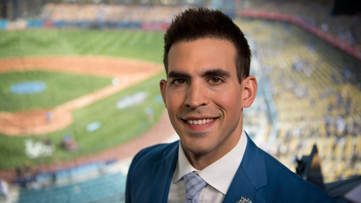 Joe Davis at his first regular-season Dodgers game as part of the announcing team, essentially replacing Vin Scully.