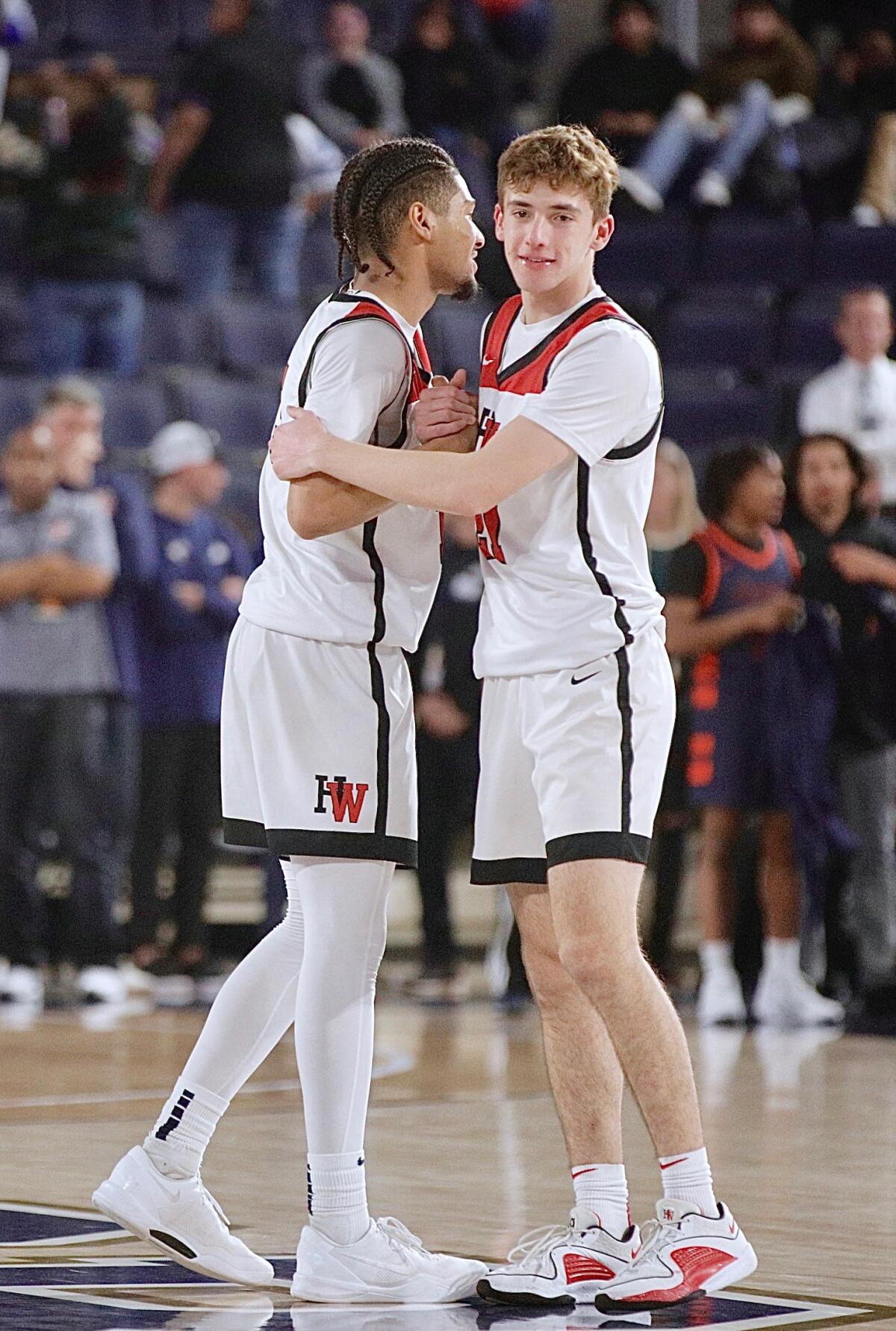 Harvard-Westlake players embrace after a game.