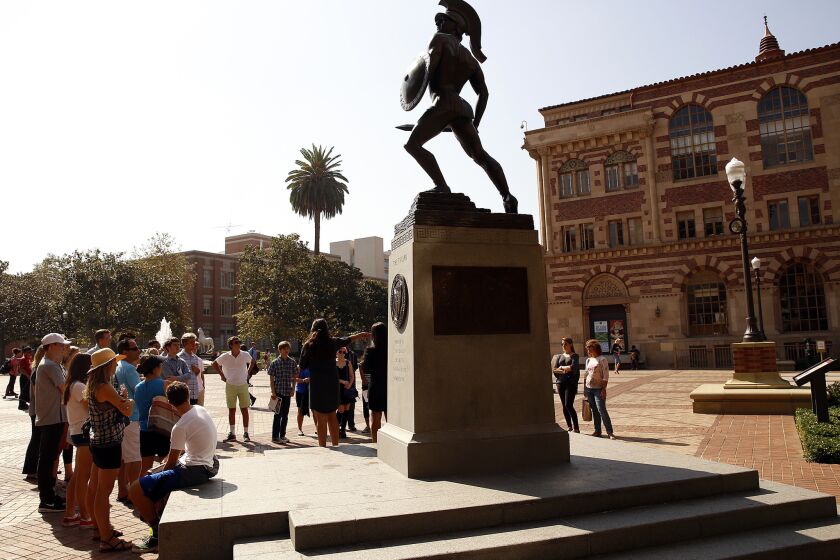An Asian undergraduate student at USC has reported that someone threw eggs at him and shouted racial slurs as he sat outside his campus residence early Sunday. Above is a file photo of the USC campus.