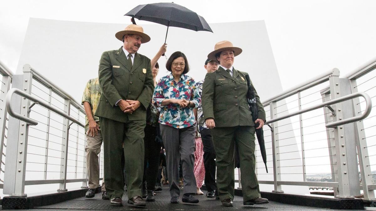 Taiwan President Tsai Ing-wen leaves the USS Arizona Memorial with National Park Services Chief Historian Daniel Martinez and Superintendent Jacqueline Ashwell in Honolulu in October,