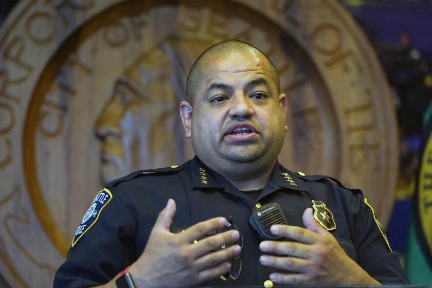 FILE - Then-Interim Seattle Police Chief Adrian Diaz addresses a news conference in Seattle, on Sept. 2, 2020. Seattle’s embattled police chief has been dismissed, Mayor Bruce Harrel said Wednesday. (AP Photo/Elaine Thompson, File)