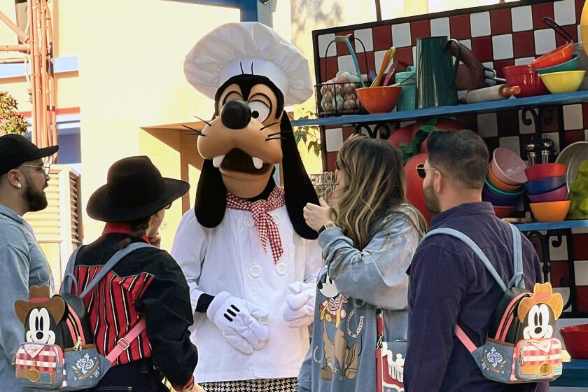 Chef Goofy visits with attendees of the Disney California Adventure Food & Wine Festival. 