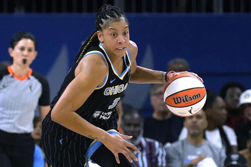 FILE - Chicago Sky's Candace Parker starts a fast break during Game 1 of the team's WNBA basketball semifinal.