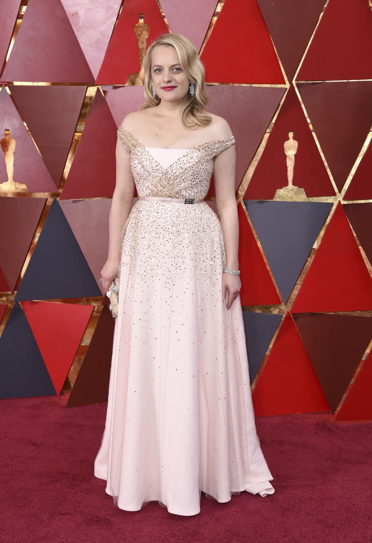 Elisabeth Moss in Dior Haute Couture.