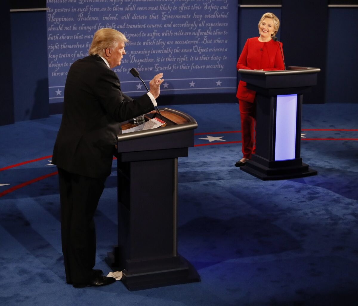 Republican Donald Trump and Democrat Hillary Clinton are seen during the presidential debate at Hofstra University.
