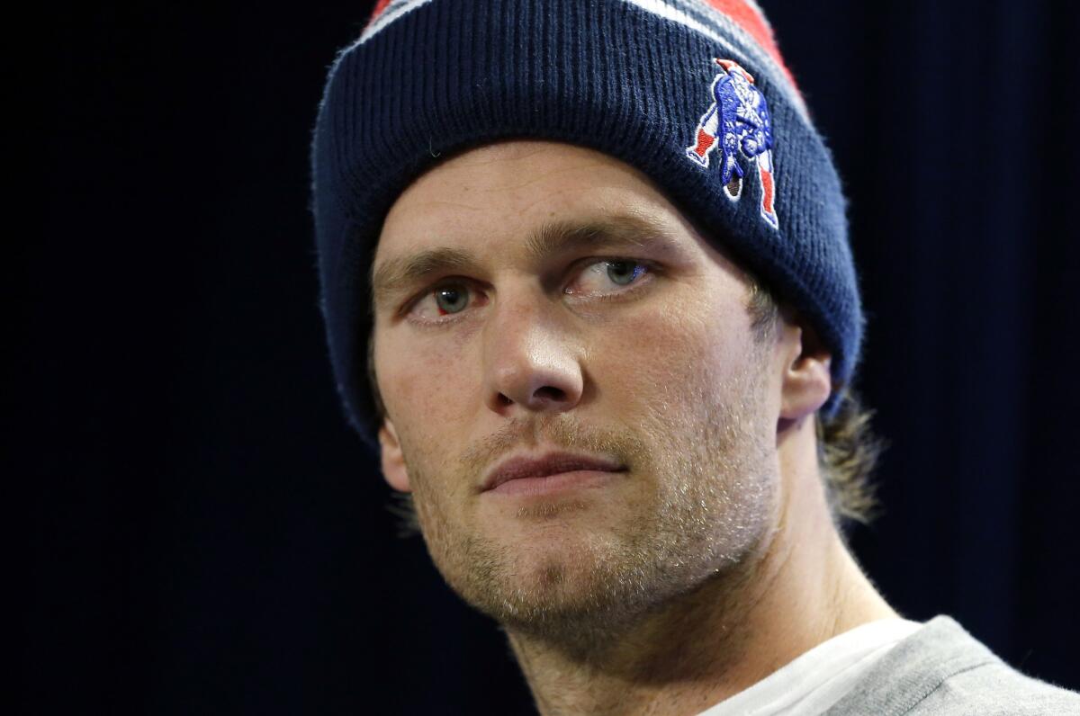 New England quarterback Tom Brady speaks at a news conference in Foxborough, Mass. on Jan. 22. Brady will go for his fourth championship ring Sunday as the Patriots take on the Seattle Seahawks in Super Bowl XLIX.