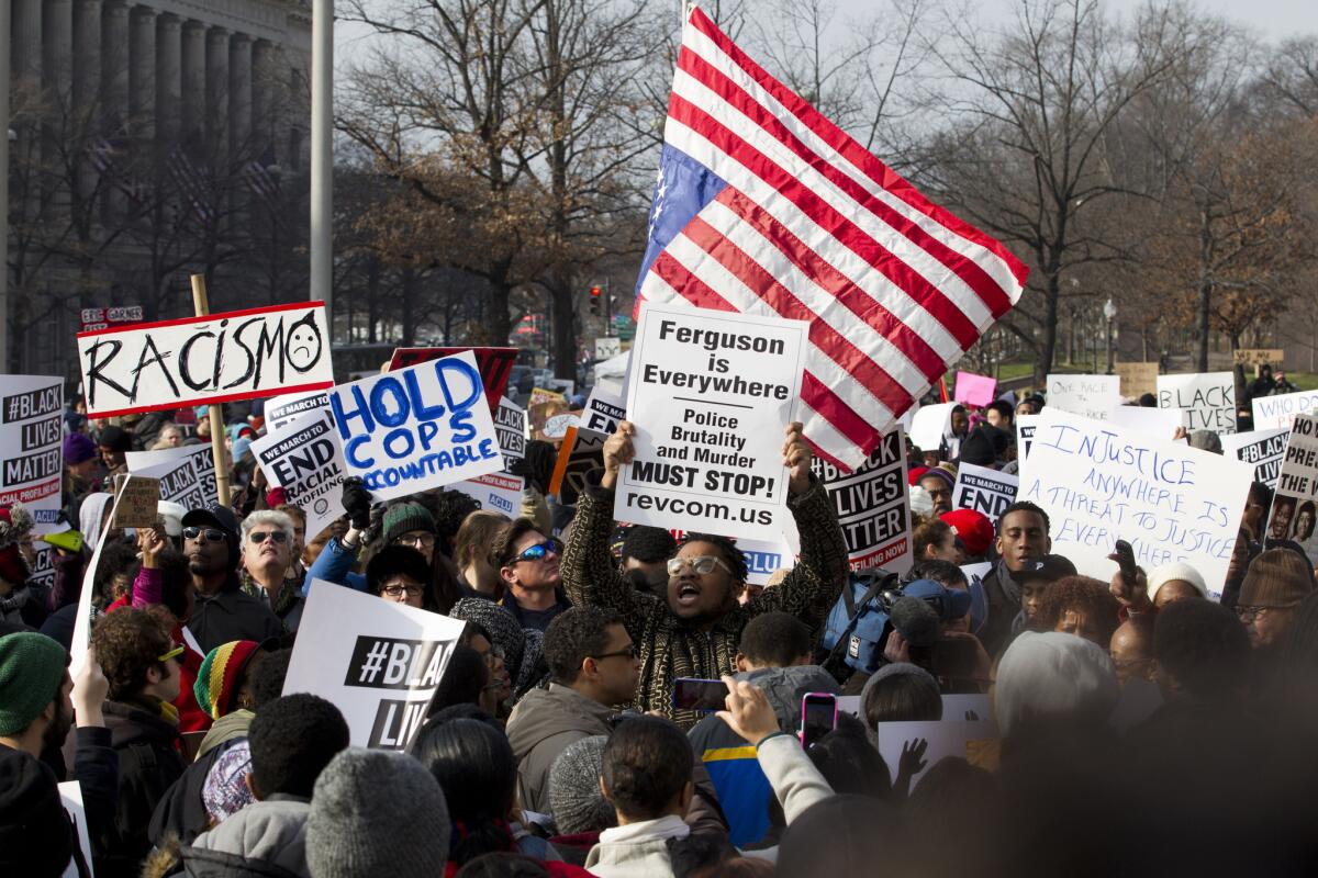 Protesters chant at Freedom Plaza in Washington, D.C.