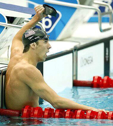 Michael Phelps celebrates