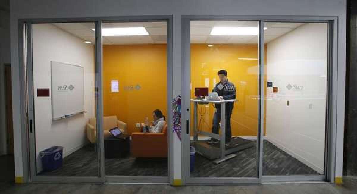 Treadmill desks are increasingly popular, and the American Medical Assn. is taking note. On Tuesday, the physicians' group recommended that employers provide workers alternatives to sitting all day.