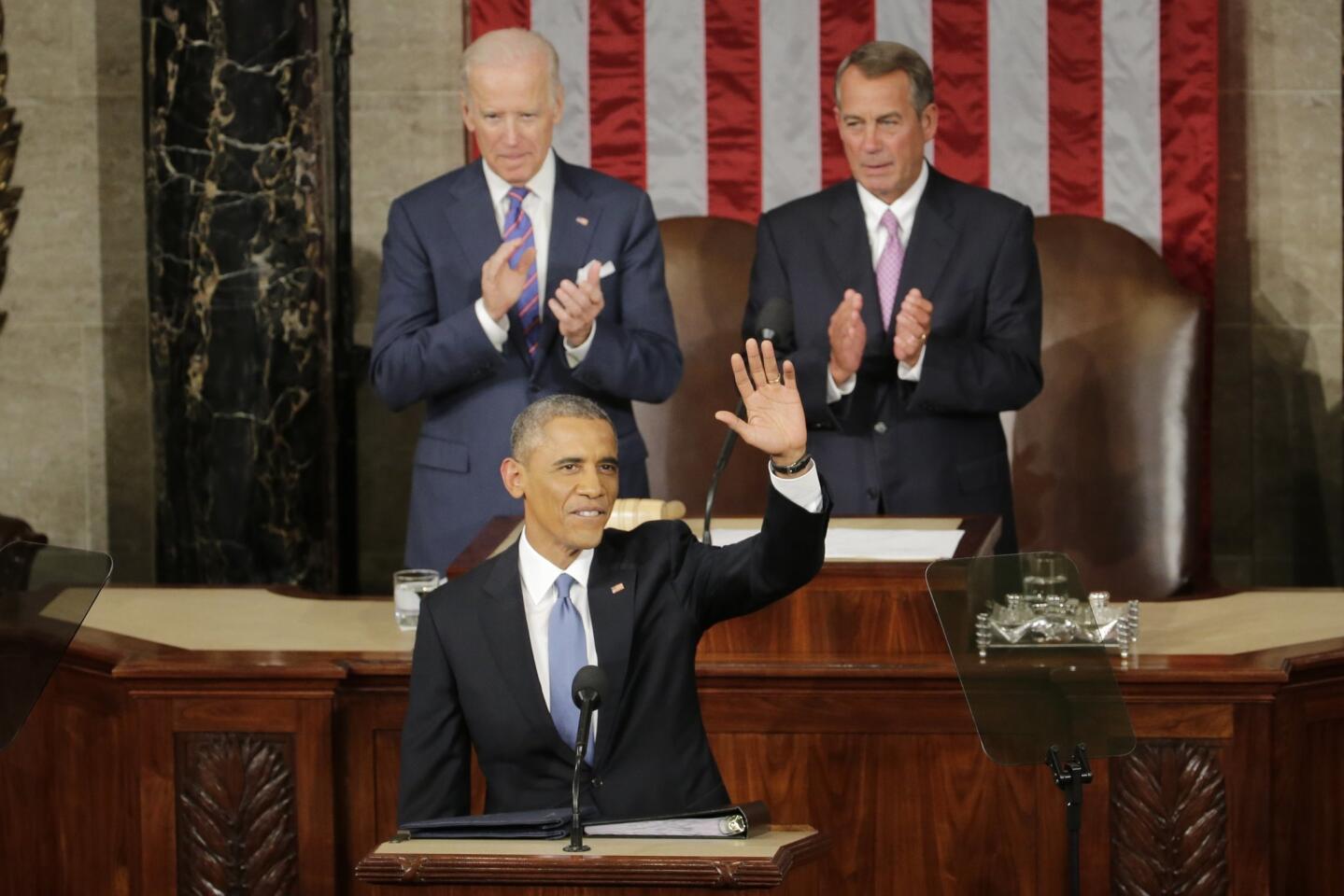 President Obama waves before giving his State of the Union address.