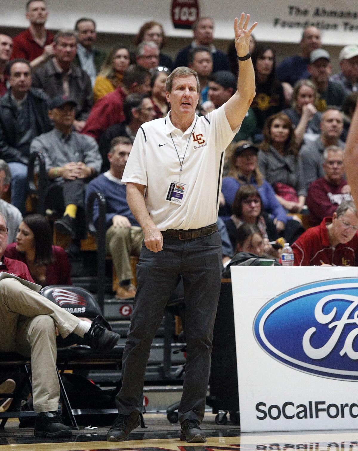 La Canada's head coach Tom Hofman calls in a play during the game against Colony in the CIF Southern Section Division II-A championship game at Azusa Pacific University on Saturday, February 23, 2019. La Canada lost the game 50-47.