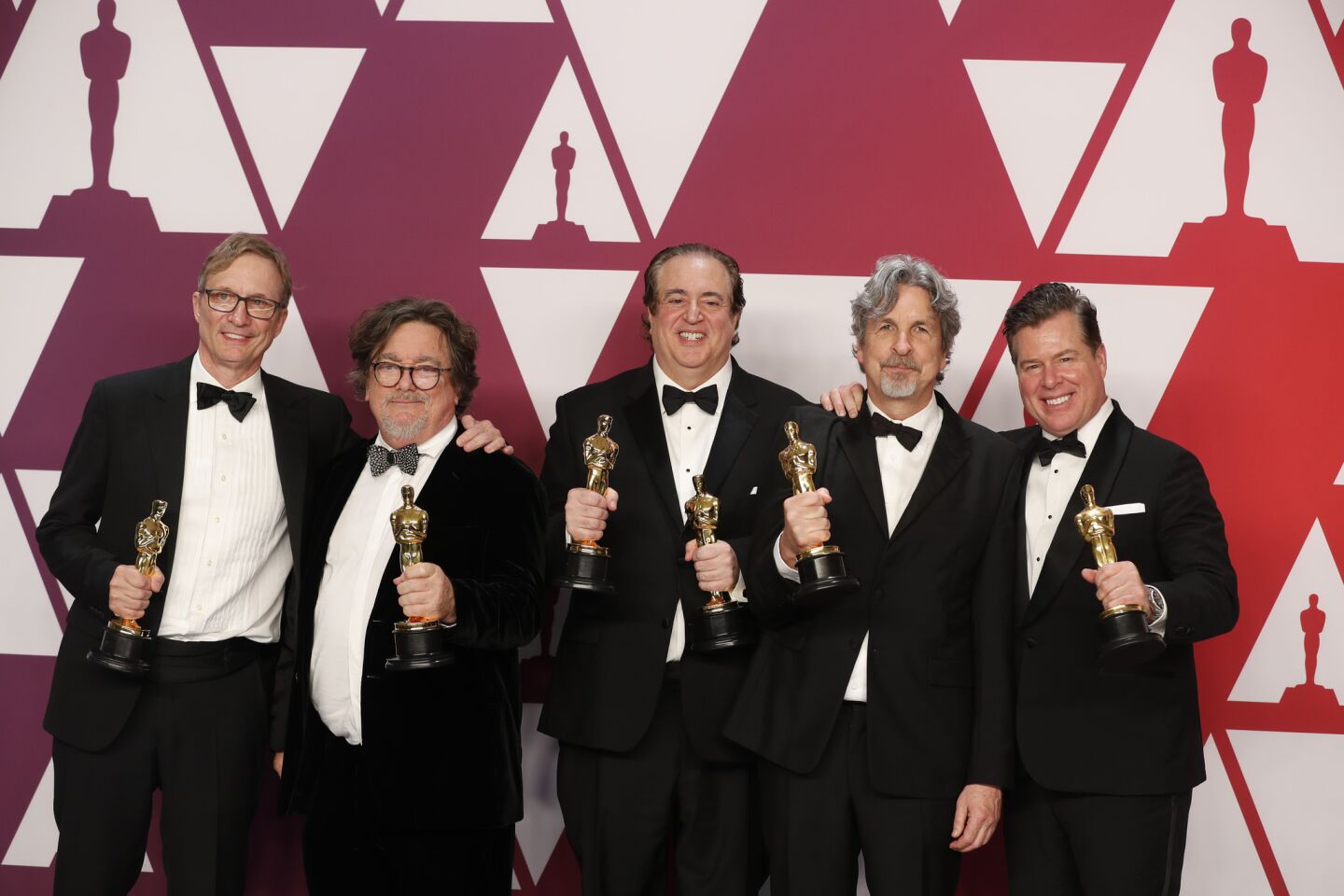 Jim Burke, Charles B. Wessler, Nick Vallelonga, Peter Farrelly and Brian Currie, winners of the best picture award for "Green Book."