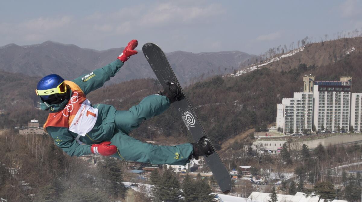 FILE - Scotty James, of Australia, rides during the men's snowboard halfpipe at the Phoenix Snow Park at he Pyeongchang 2018 Winter Olympic Games in South Korea, Tuesday, Feb. 13, 2018. James has come a long way since his dad bought him a $10 snowboard from a shop that was using it as a doorstop. He’s won three world championship titles, six World Cup races and six Winter X medals, including three gold. (Jonathan Hayward/The Canadian Press via AP, File)