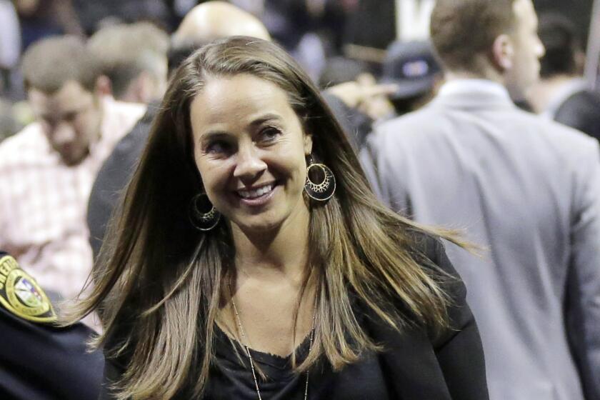 Becky Hammon walks off the court following Game 5 of the NBA playoff series between the San Antonio Spurs and the Dallas Mavericks in San Antonio on April 30.