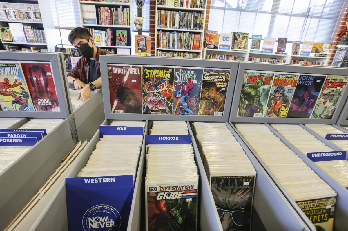 Comic books arranged by category, including "western," "war" and "horror"