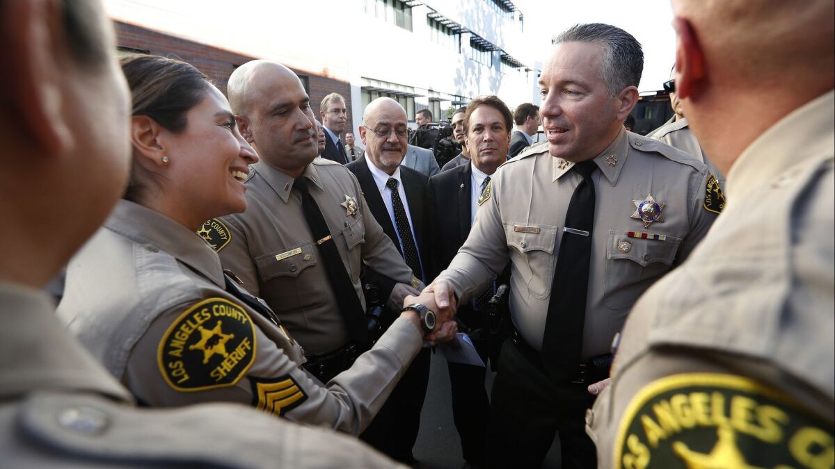 Alex Villanueva, the new Los Angeles County Sheriff, greets members of the force after his swearing-in ceremony in Monterey Park on December 3, 2018.