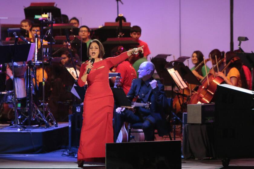 Gloria Estefan performs Friday night at the Hollywood Bowl accompanied by members of Youth Orchestra Los Angeles.