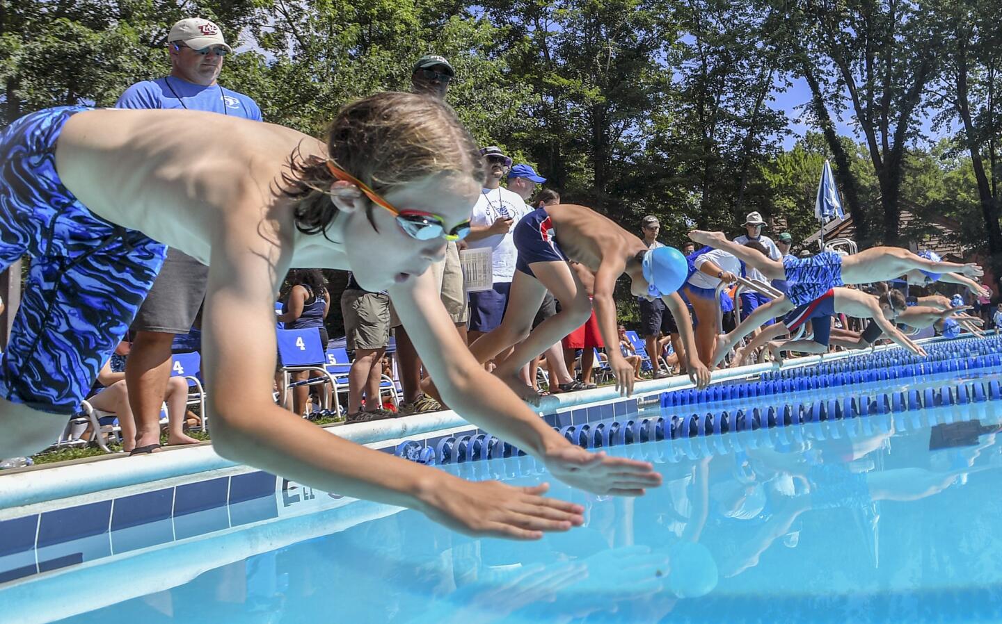 Clemens Crossing's Cedrick Hotopp is off at the start of the boys 11-12 50 yard breaststroke event during the Columbia Neighborhood Swim League meet between host Clemens Crossing and Harper's Choice Saturday morning in Columbia.
