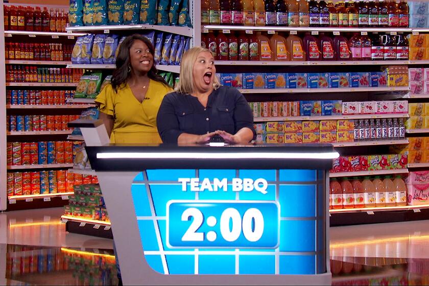 “Supermarket Sweep” contestants Angela Brown (left) and Yolanda Bowles (right) 