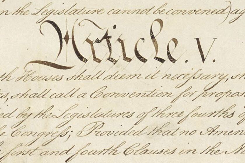 This photo made available by the U.S. National Archives shows a portion of the United States Constitution with the title of Article V. For the past two centuries, constitutional amendments have originated in Congress, where they need the support of two-thirds of both houses, and then the approval of at least three-quarters of the states. But under a never-used second prong of Article V, amendments can originate in the states. (National Archives via AP)