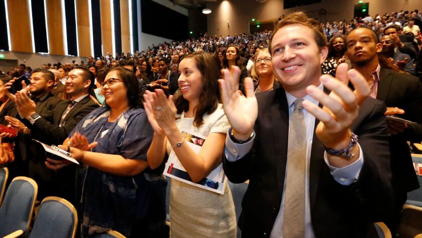 LAUSD School Board members applaud at the superintendent's address to the L.A. Unified Board of Education and nearly 1,500 principals, assistant principals and other top administrators at Garfield High School on August 8, 2017.